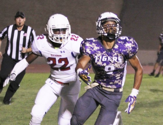 Sports Column: Former standout gridiron star Allen Perryman joins COS football staff Lemoore High School's Allen Perryman, in action for his Tigers' football team. Perryman recently joined the College of the Sequoias football coaching staff.